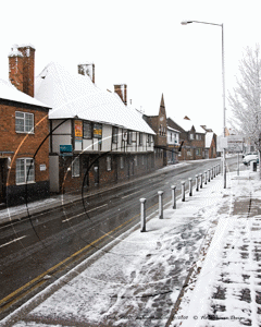 The Overhangs in Peach Street, Wokingham in Berkshire on the snowy morning of Sunday 6th April 2008